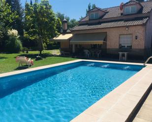 Piscina de Casa o xalet en venda en Villacarrillo amb Calefacció, Jardí privat i Terrassa