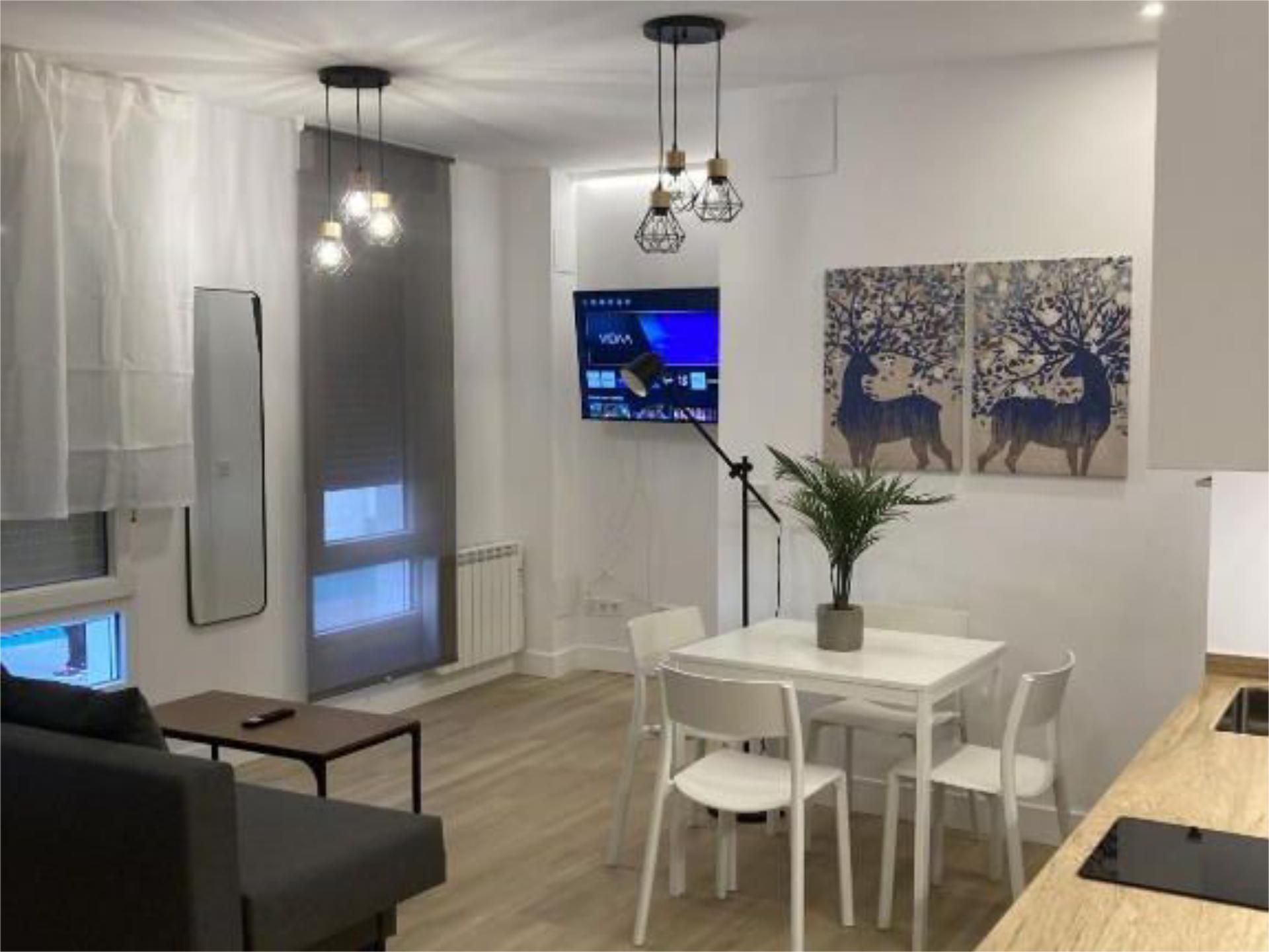 Living room of Flat to rent in  Madrid Capital  with Air Conditioner, Terrace and Community parking