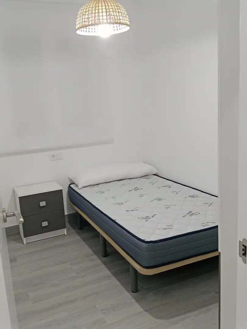 Pis de lloguer a Andalucía, 42, Alcaudete Dormitori de Pis de lloguer en Alcaudete amb Aire condicionat, Calefacció i Moblat