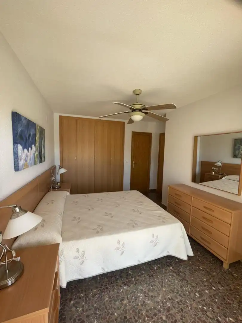 Schlafzimmer von Wohnung zum Verkauf in Cullera mit Klimaanlage, Terrasse und Schwimmbad