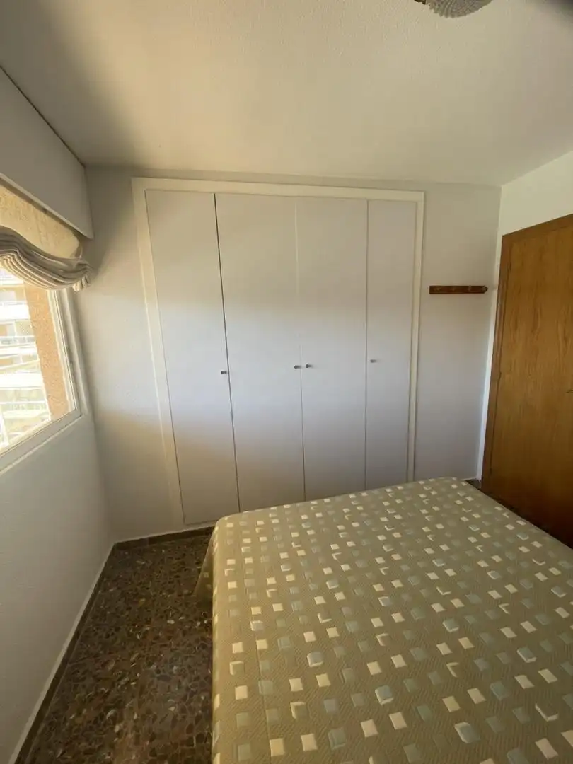 Schlafzimmer von Wohnung zum Verkauf in Cullera mit Klimaanlage, Terrasse und Schwimmbad
