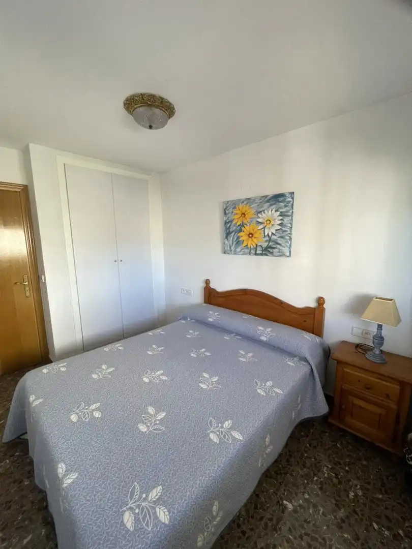 Schlafzimmer von Wohnung zum Verkauf in Cullera mit Klimaanlage, Terrasse und Schwimmbad