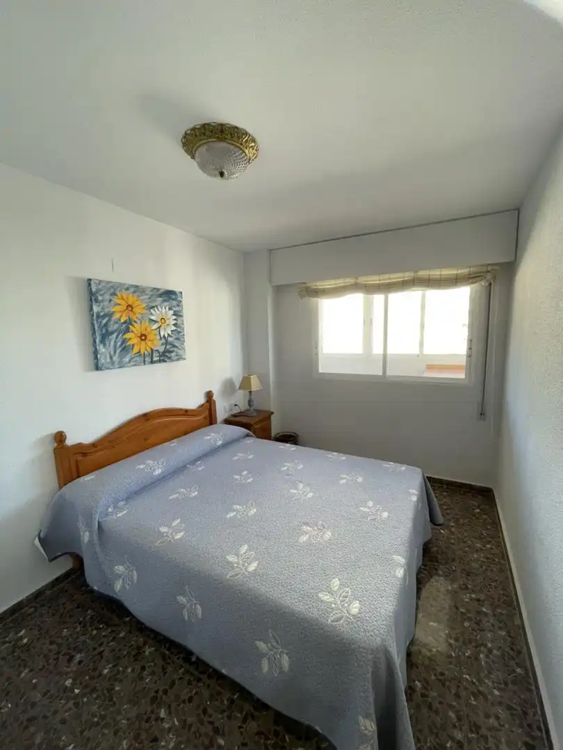 Schlafzimmer von Wohnung zum Verkauf in Cullera mit Klimaanlage, Terrasse und Schwimmbad