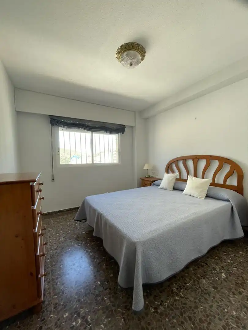 Schlafzimmer von Wohnung zum Verkauf in Cullera mit Klimaanlage, Terrasse und Schwimmbad