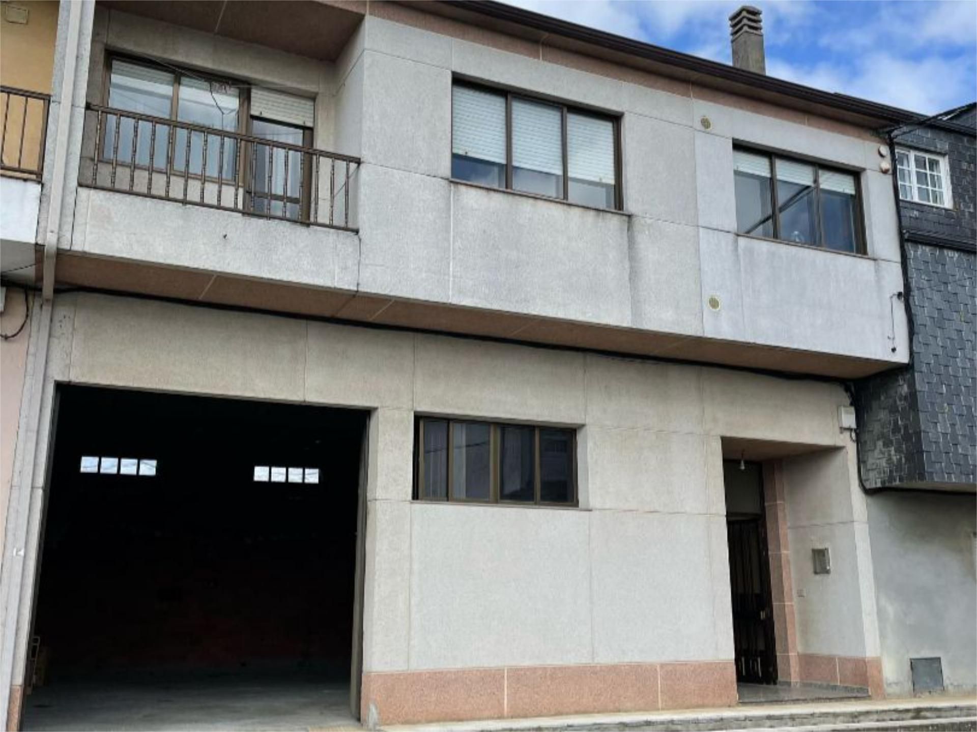 Vista exterior de Casa adosada en venda en A Pastoriza  amb Calefacció, Parquet i Terrassa