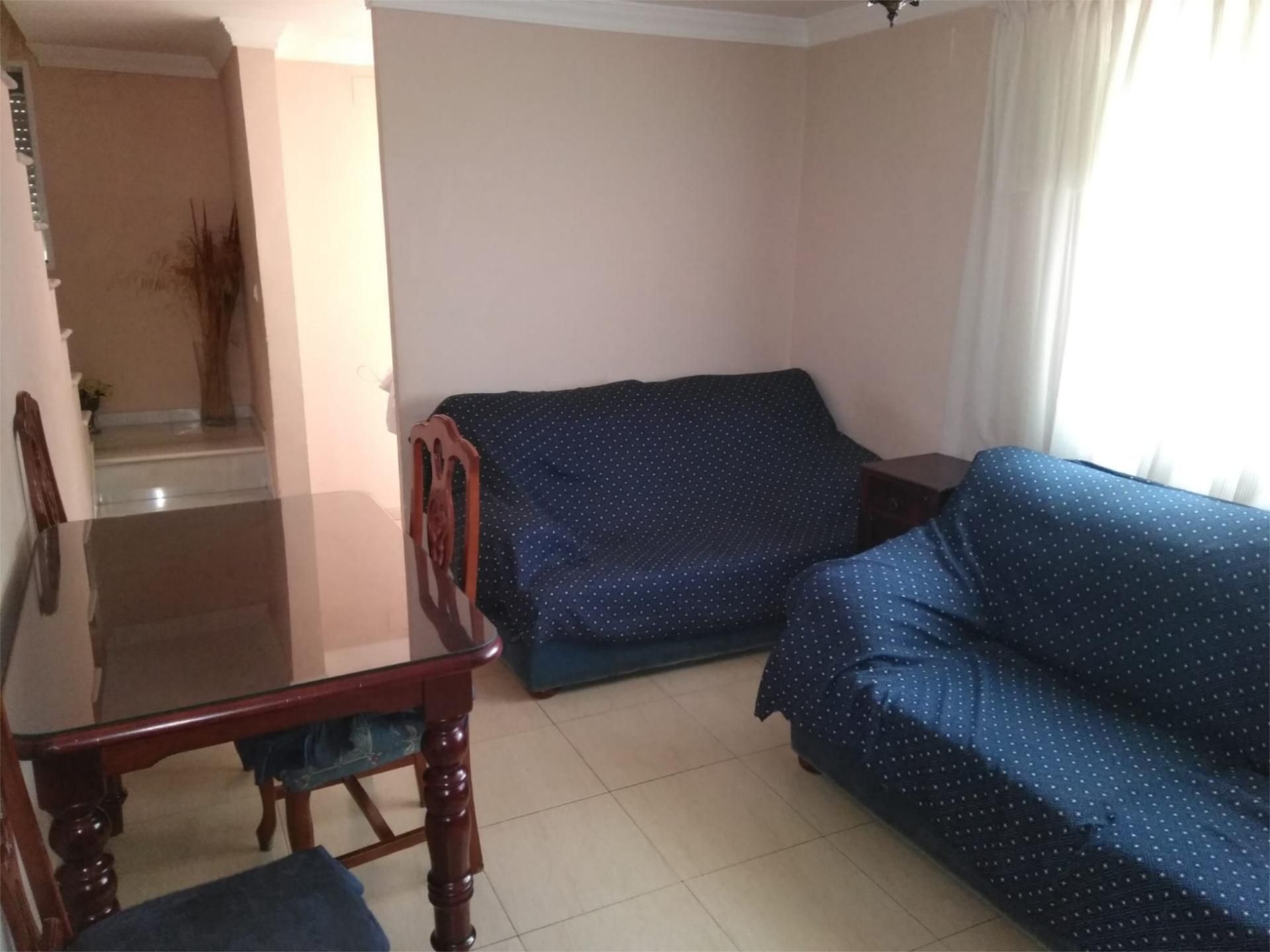 Sala d'estar de Casa adosada en venda en Écija amb Aire condicionat i Calefacció
