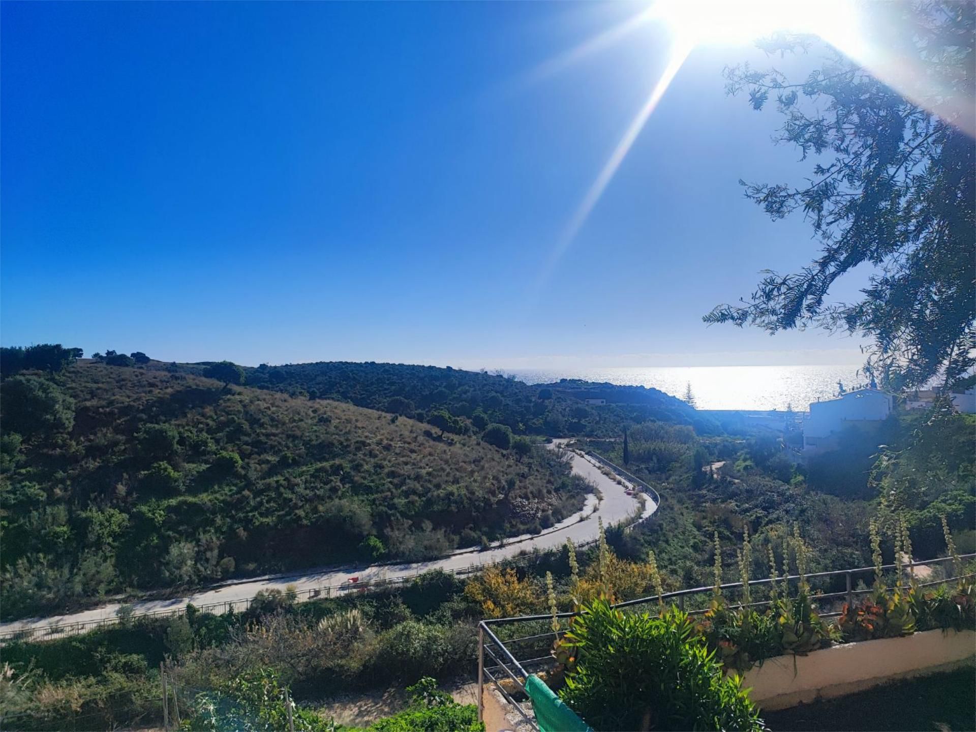 Exterior view of Single-family semi-detached for sale in Vélez-Málaga  with Air Conditioner, Terrace and Swimming Pool