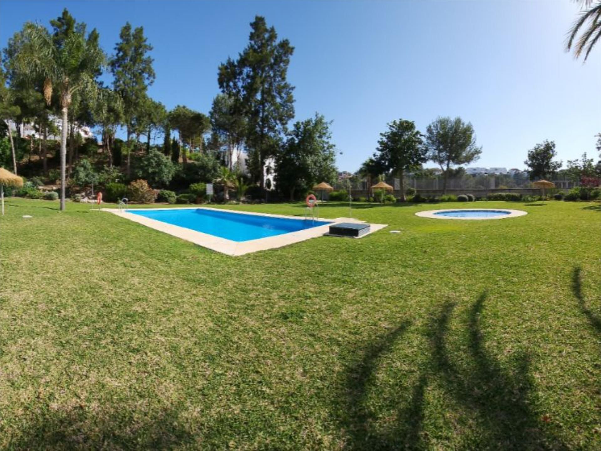 Swimming pool of Flat for sale in Benalmádena  with Air Conditioner, Heating and Private garden