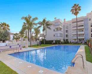 Swimming pool of Flat for sale in Marbella  with Air Conditioner, Heating and Private garden