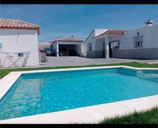 Exterior view of Single-family semi-detached for sale in Chiclana de la Frontera  with Private garden, Storage room and Swimming Pool