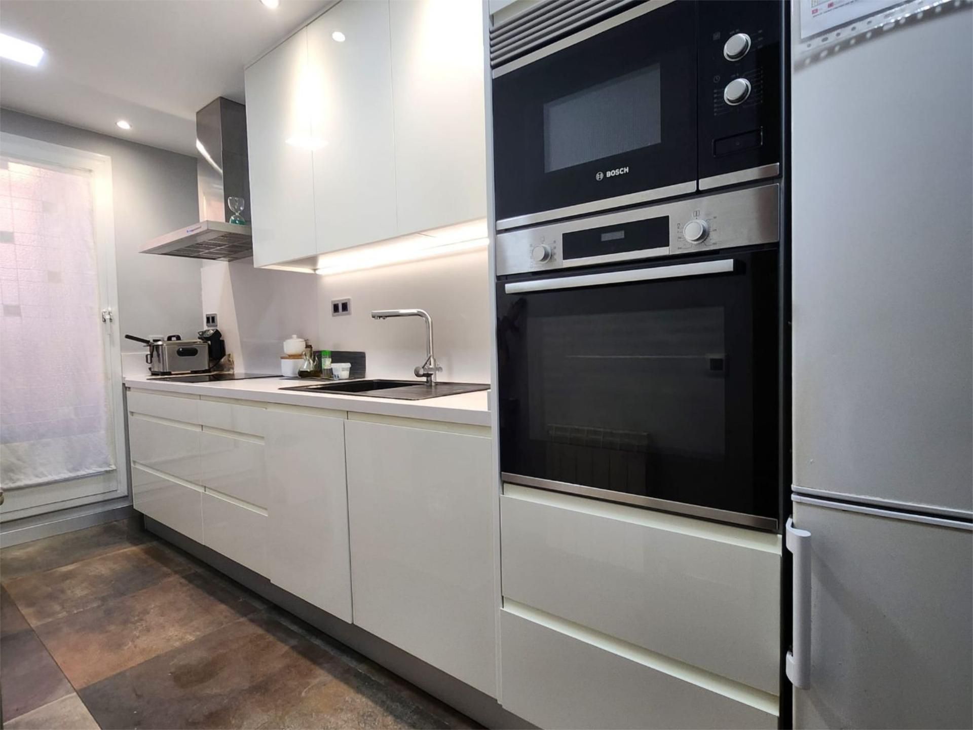 Kitchen of Flat for sale in Sabadell  with Air Conditioner and Balcony