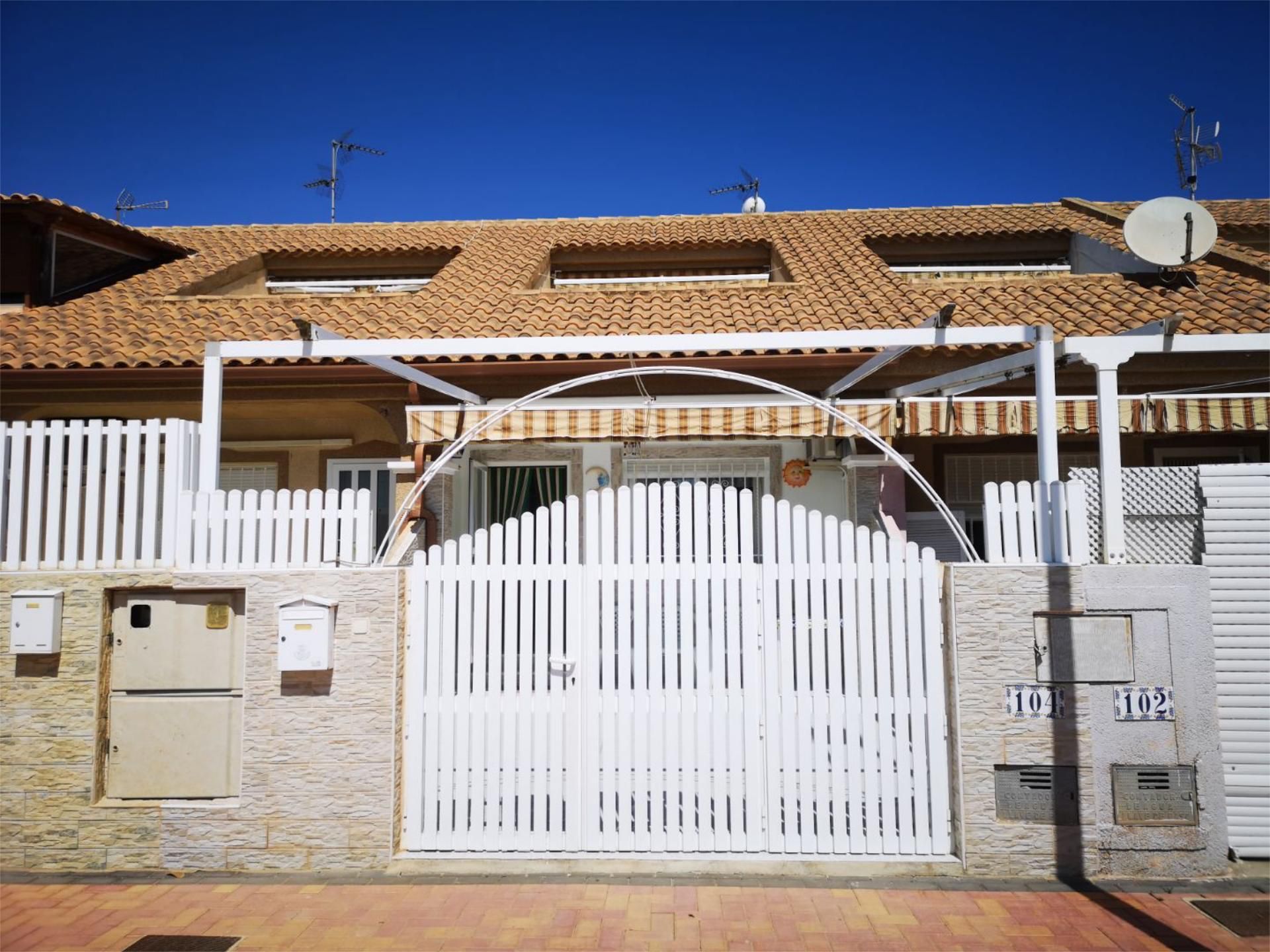 Exterior view of Duplex for sale in Los Alcázares  with Air Conditioner, Heating and Private garden