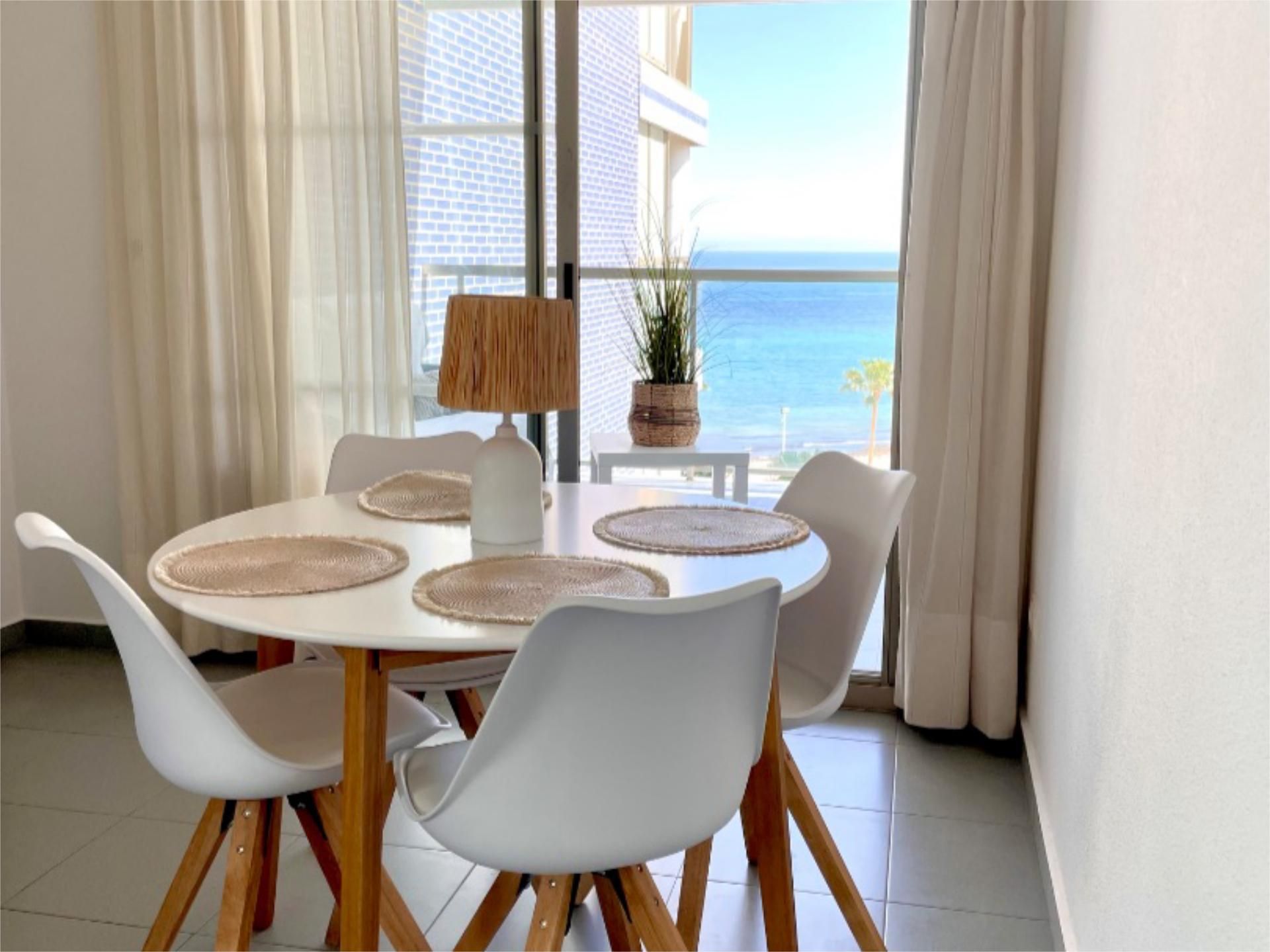 Dining room of Flat for sale in Calpe / Calp  with Air Conditioner, Terrace and Swimming Pool