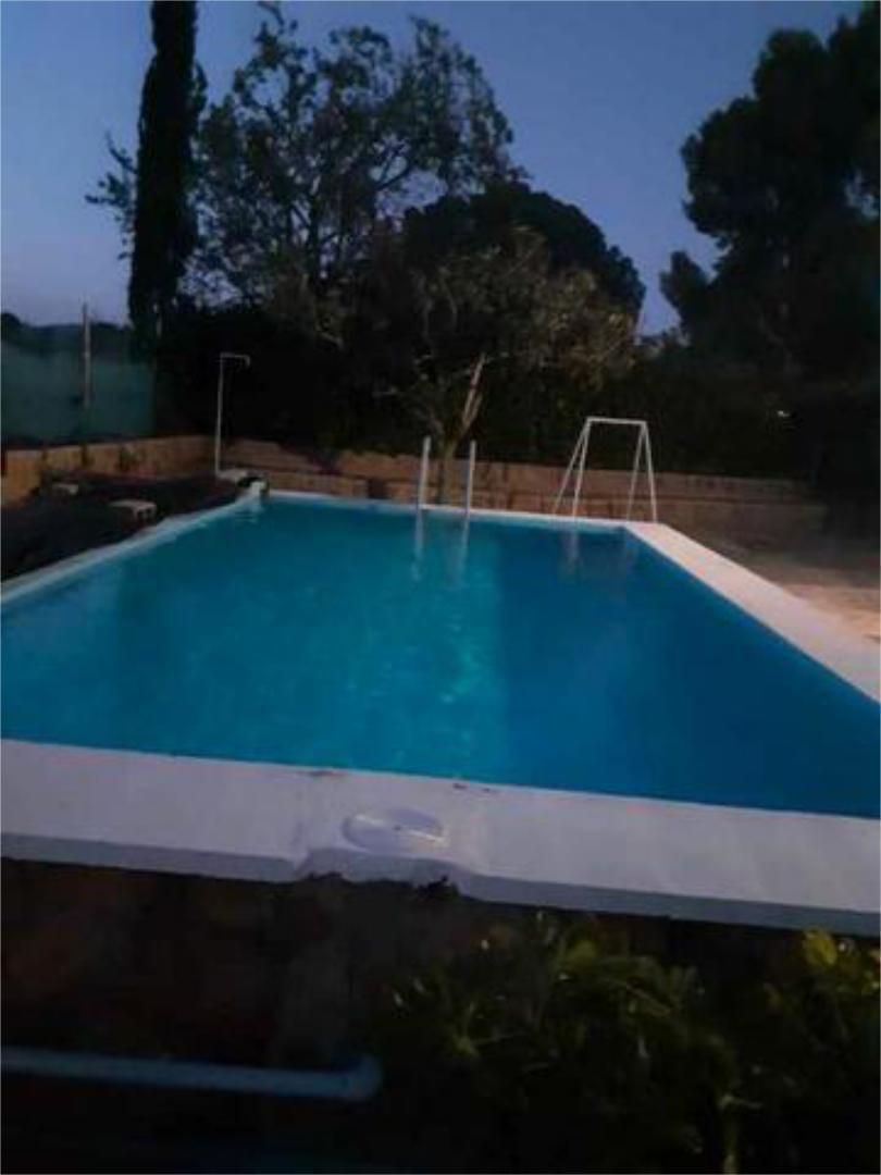 Piscina de Casa adosada en venda en Náquera amb Calefacció, Jardí privat i Terrassa