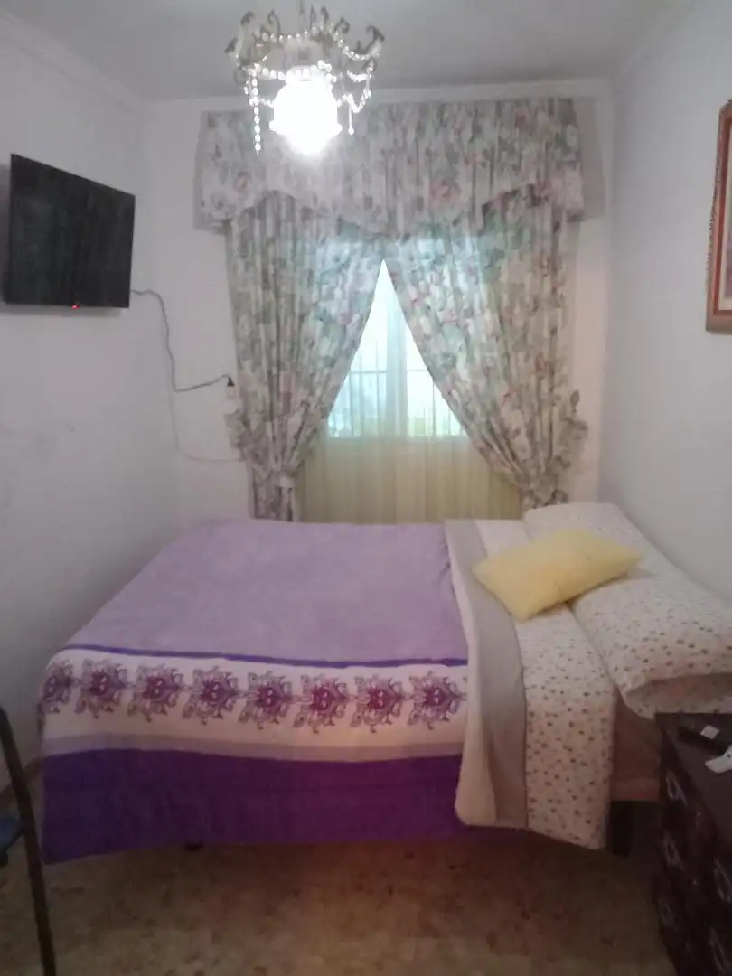 Dormitori de Casa adosada en venda en Fuente-Tójar amb Jardí privat