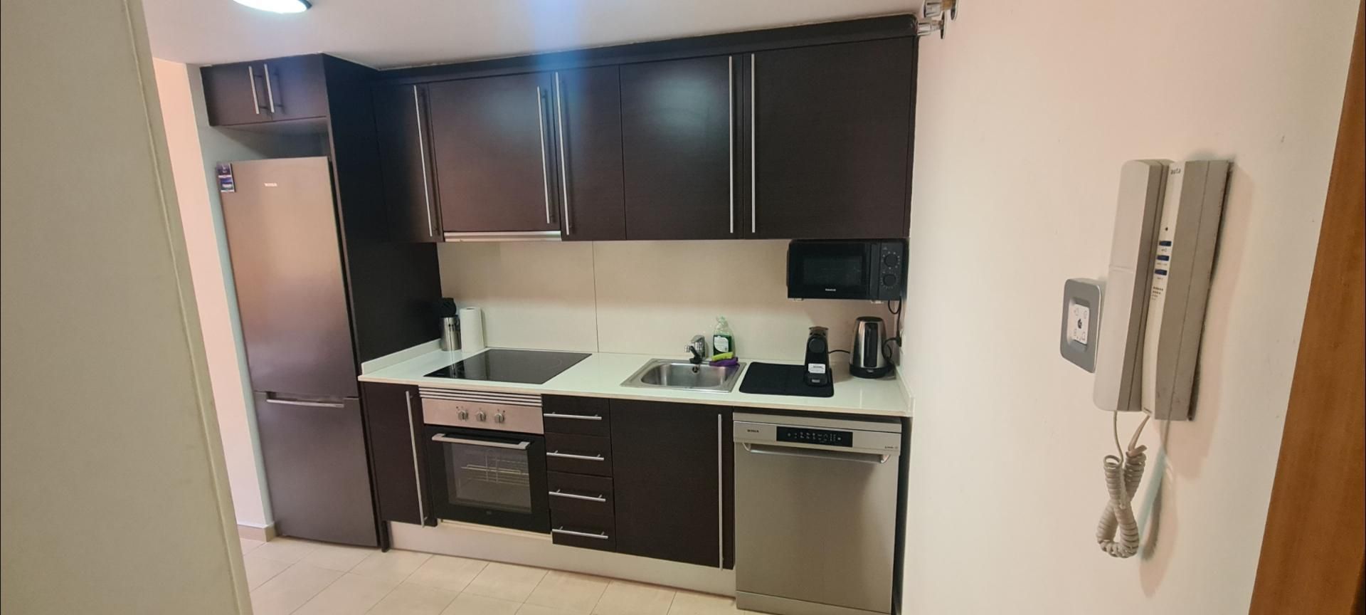 Kitchen of Flat for sale in La Bisbal d'Empordà  with Air Conditioner and Terrace