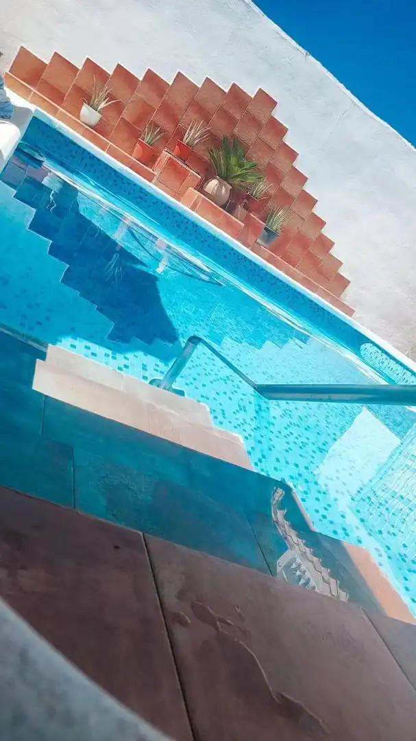 Houses for sale in Avenida Principal, 10, El Higuerón Swimming pool of Houses for sale in Córdoba with Air Conditioner, Heating and Terrace