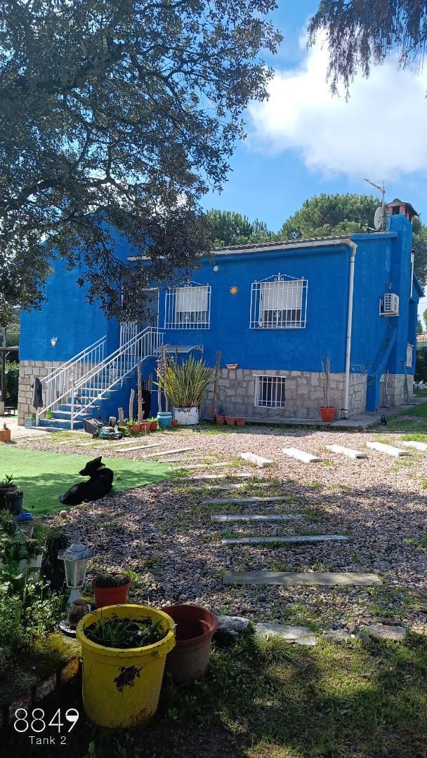 Vista exterior de Casa o xalet en venda en Colmenar del Arroyo amb Aire condicionat, Calefacció i Jardí privat