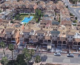 Exterior view of Single-family semi-detached for sale in Orihuela  with Terrace, Swimming Pool and Balcony