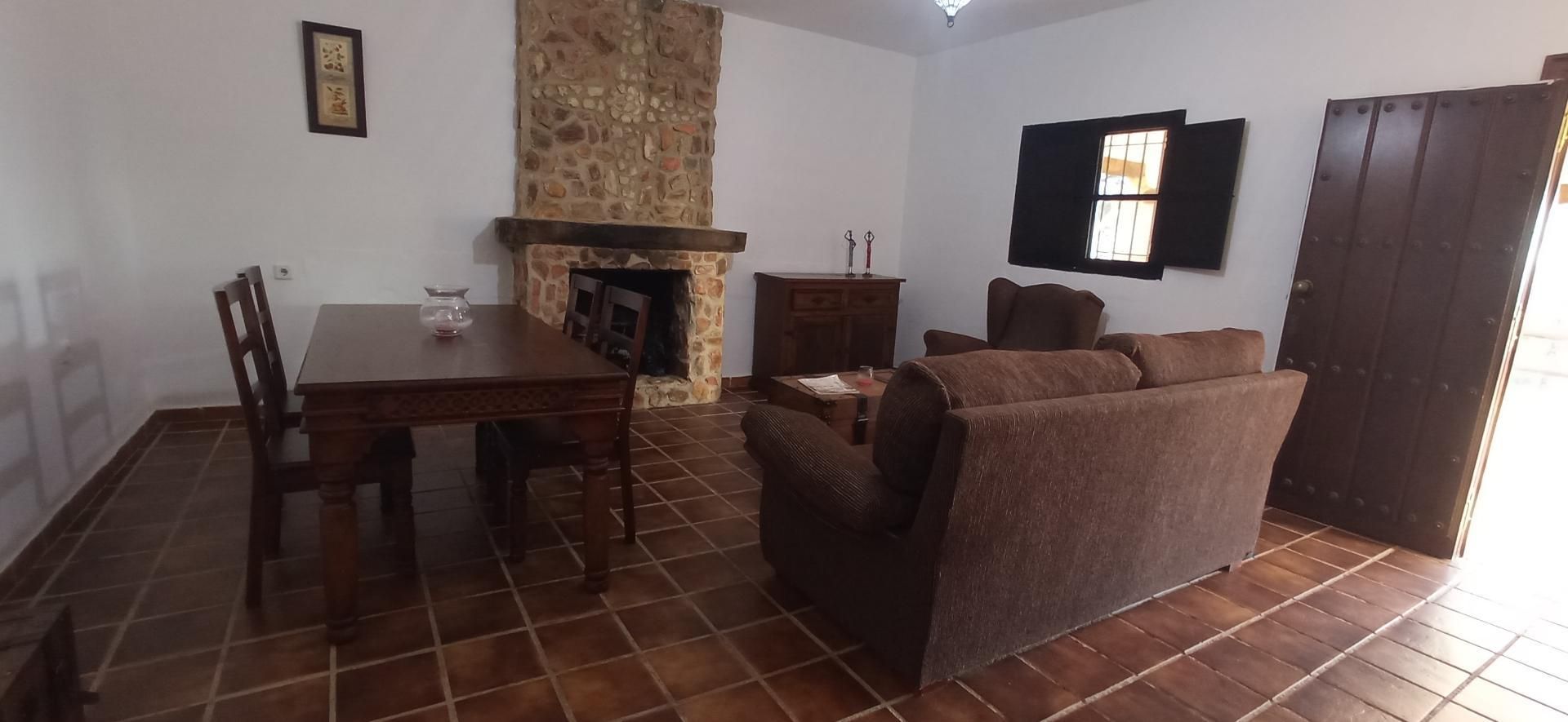 Sala d'estar de Casa o xalet en venda en Beas amb Terrassa