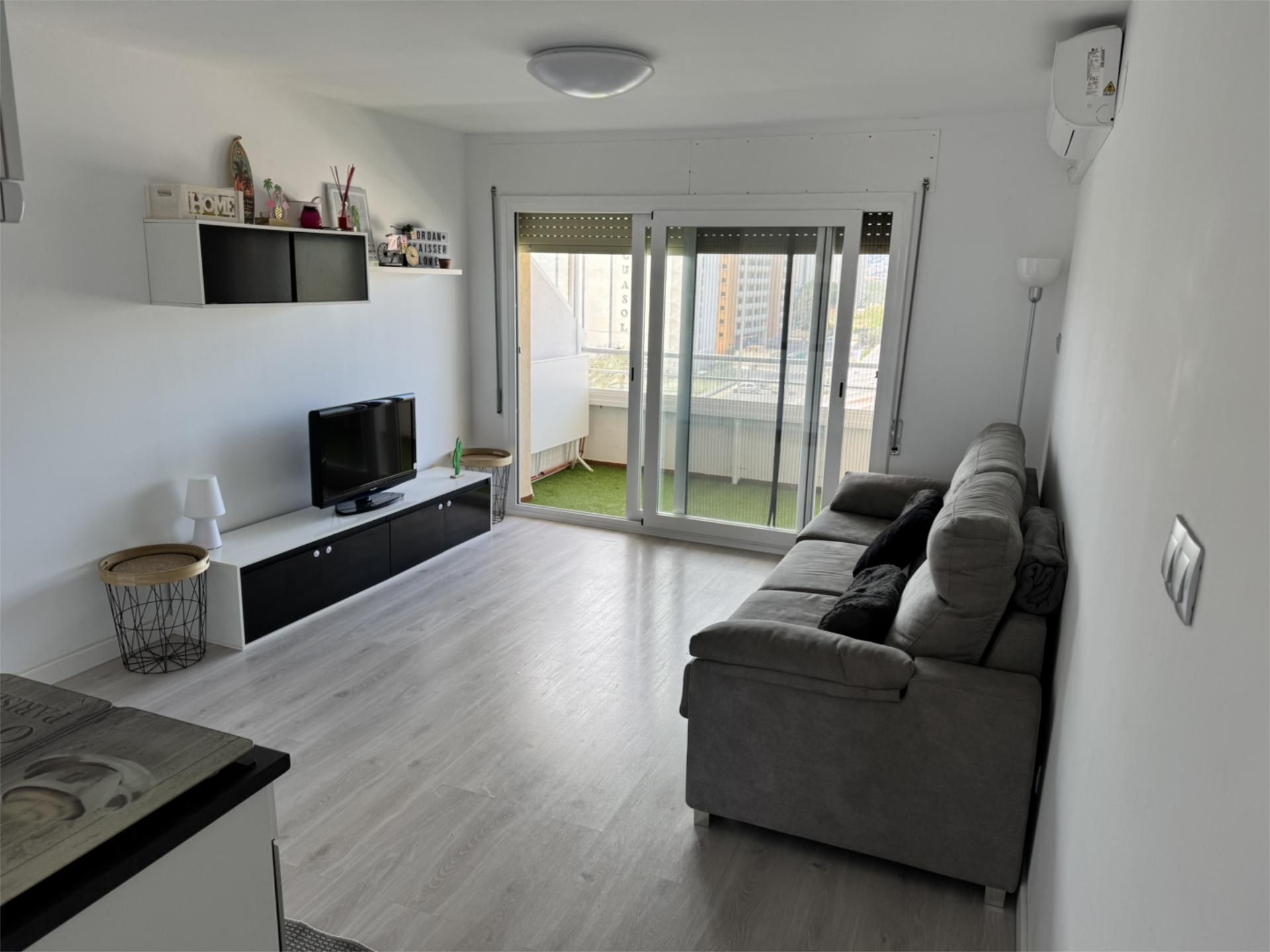 Sala d'estar de Apartament en venda en Peñíscola / Peníscola amb Aire condicionat, Terrassa i Piscina