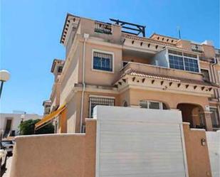 Vista exterior de Casa adosada en venda en Orihuela amb Terrassa i Piscina