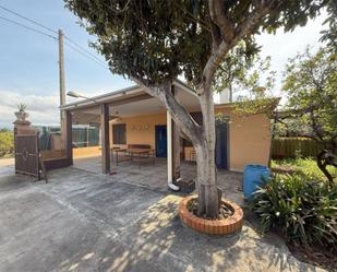 Exterior view of House or chalet for sale in Alzira  with Terrace and Swimming Pool