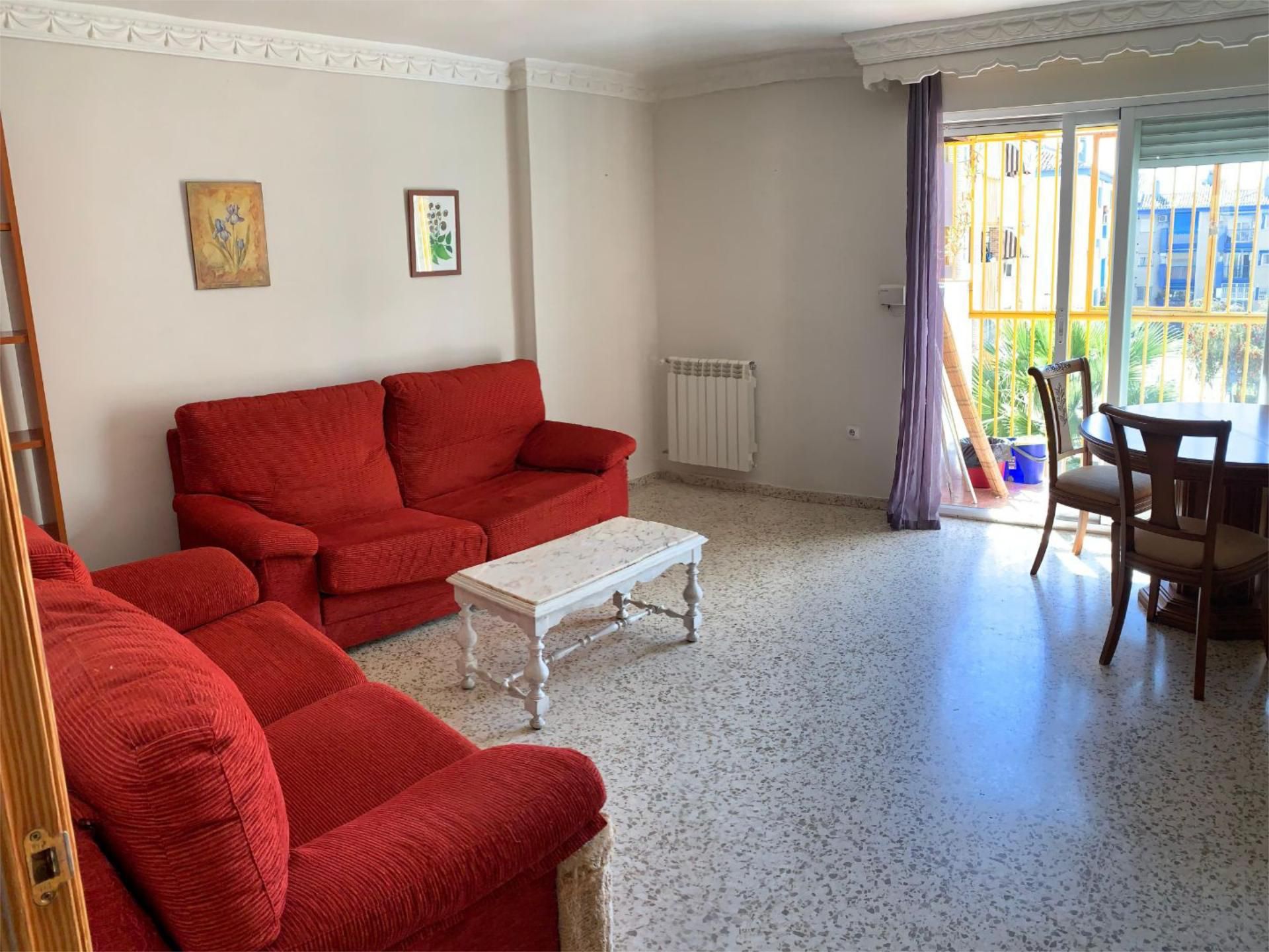 Sala d'estar de Pis per a compartir en  Granada Capital amb Calefacció, Terrassa i Moblat