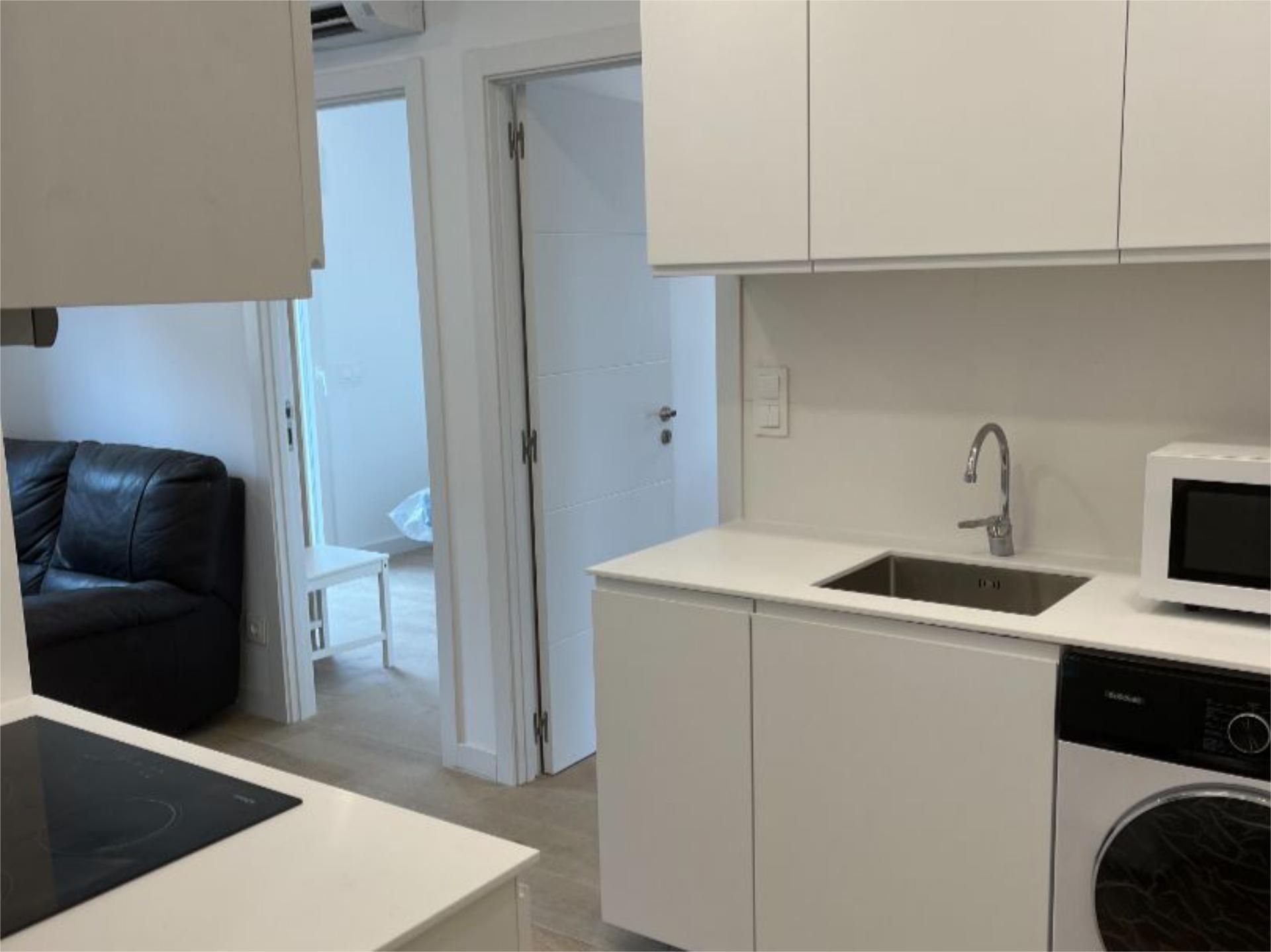 Kitchen of Flat for sale in  Madrid Capital  with Air Conditioner, Terrace and Furnished