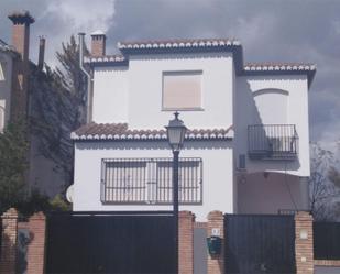 Exterior view of House or chalet for sale in Cúllar Vega  with Air Conditioner and Swimming Pool