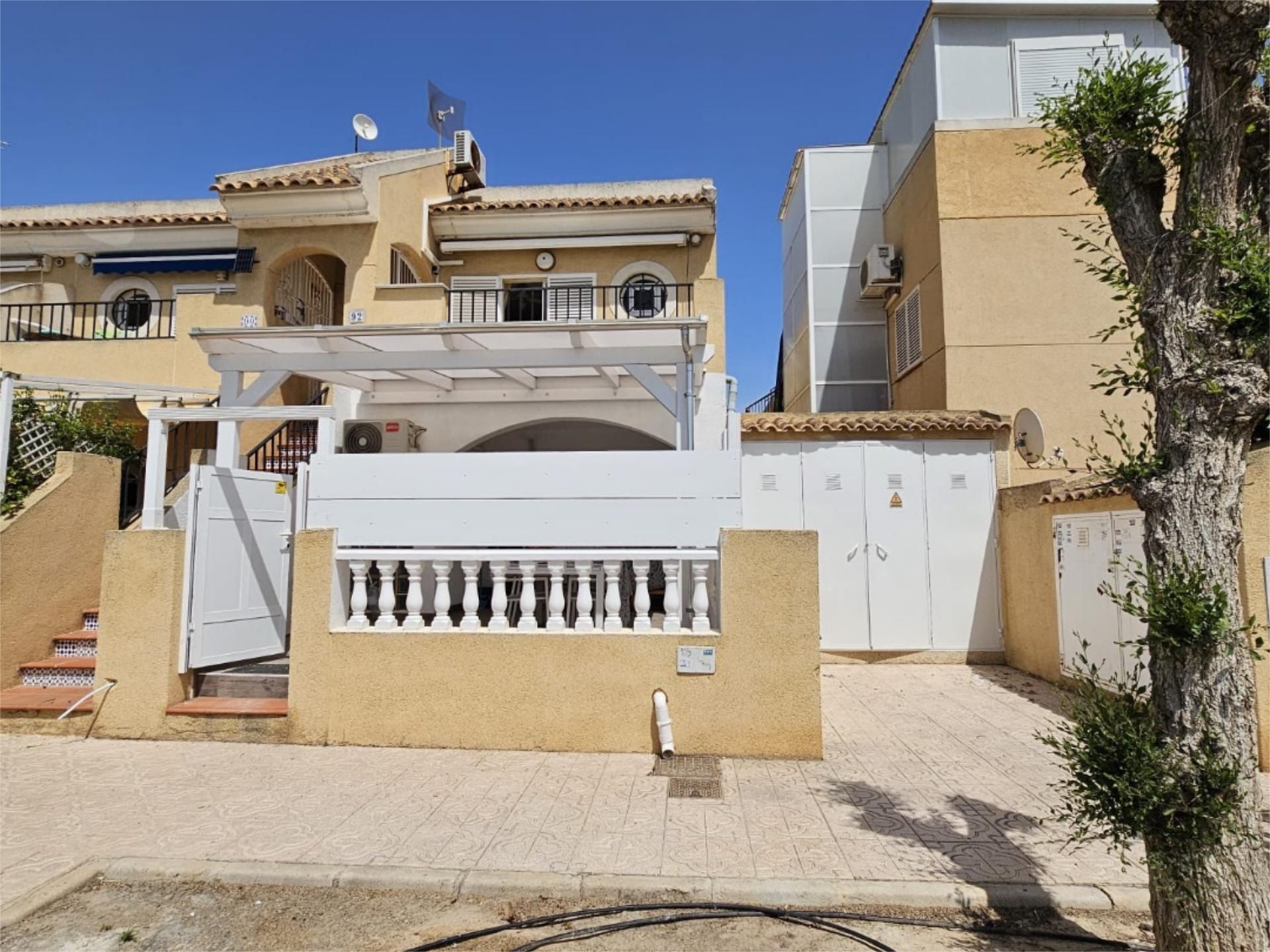 Exterior view of Duplex for sale in Guardamar del Segura  with Air Conditioner, Terrace and Swimming Pool