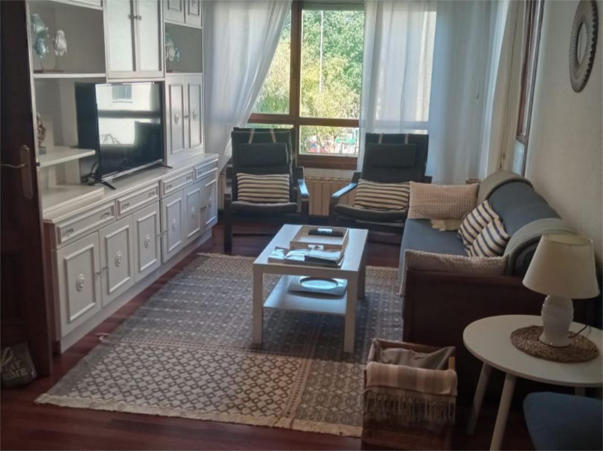 Living room of Flat to rent in Santander  with Heating, Private garden and Parquet flooring