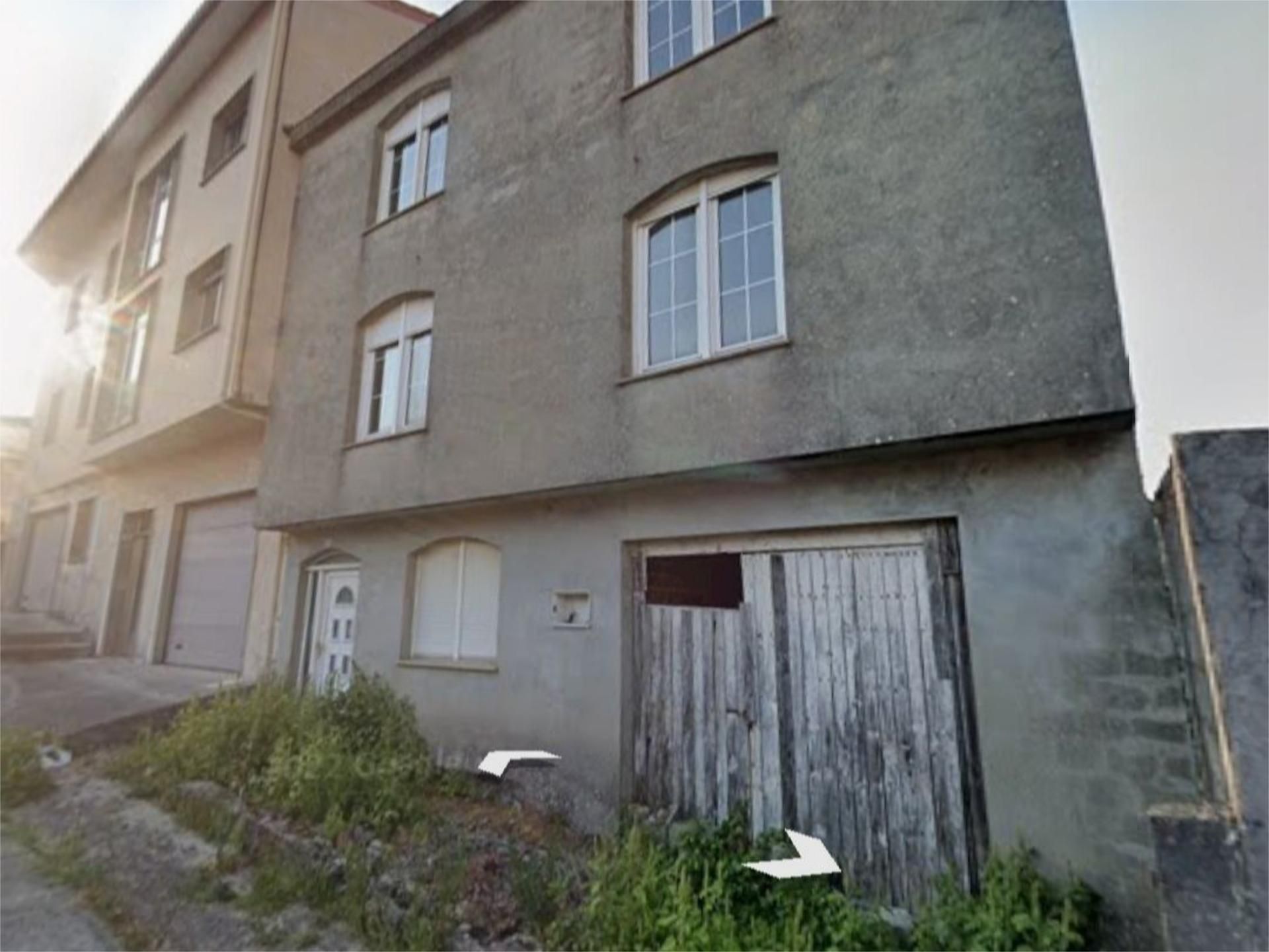 Vista exterior de Casa adosada en venda en Fisterra amb Jardí privat