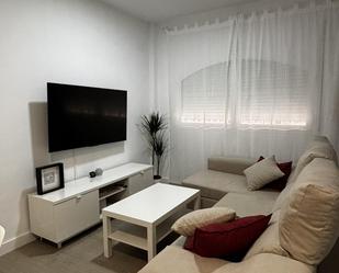 Living room of Flat to rent in Sanlúcar la Mayor  with Air Conditioner, Private garden and Parquet flooring