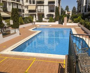 Swimming pool of Flat to share in Armilla  with Air Conditioner, Heating and Private garden