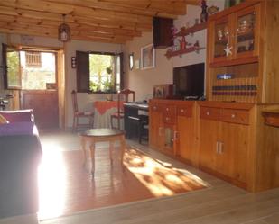 Sala d'estar de Casa adosada en venda en Villaviciosa amb Terrassa