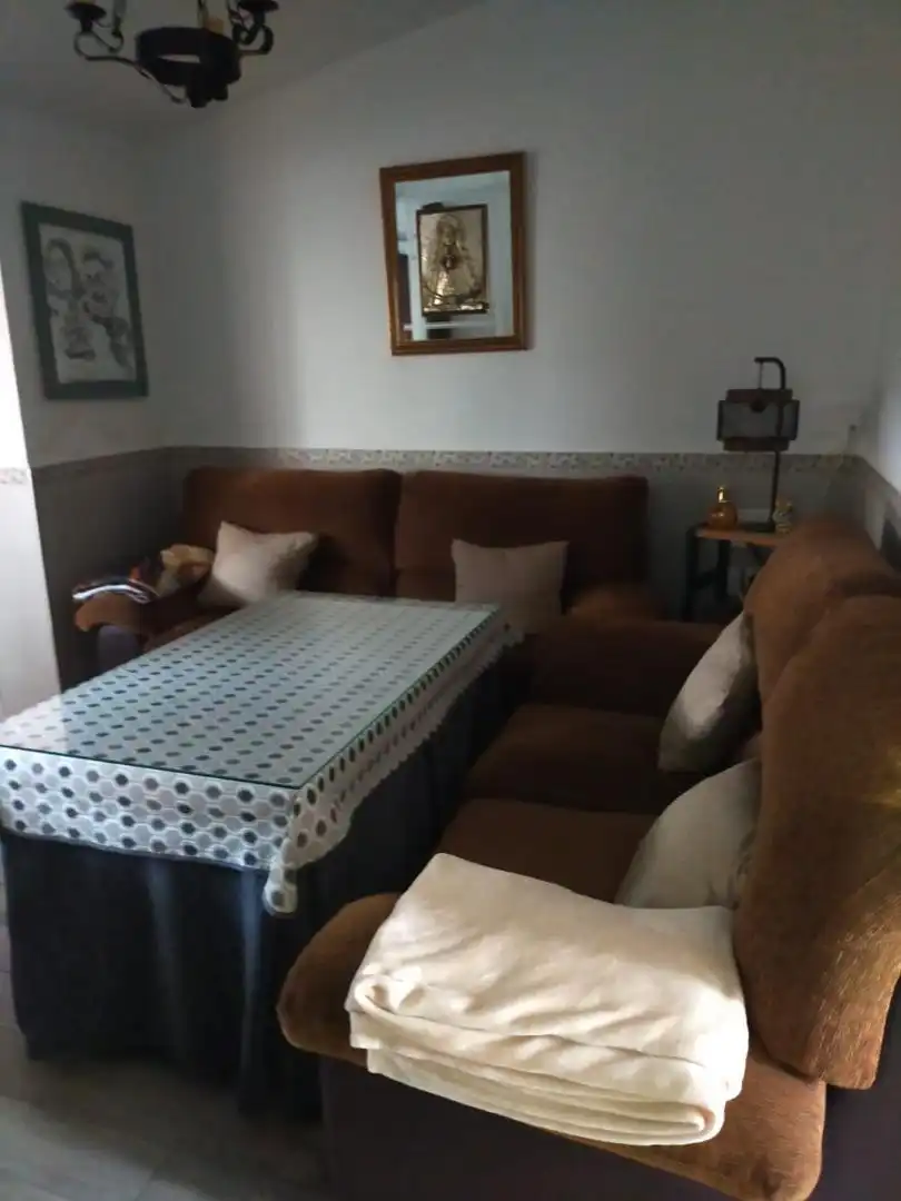Sala d'estar de Casa adosada en venda en Cortegana