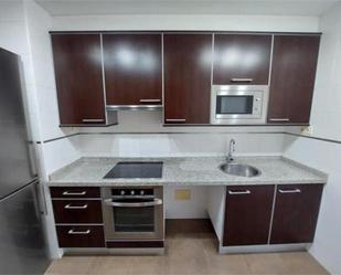Kitchen of Flat for sale in Gijón   with Heating, Private garden and Storage room