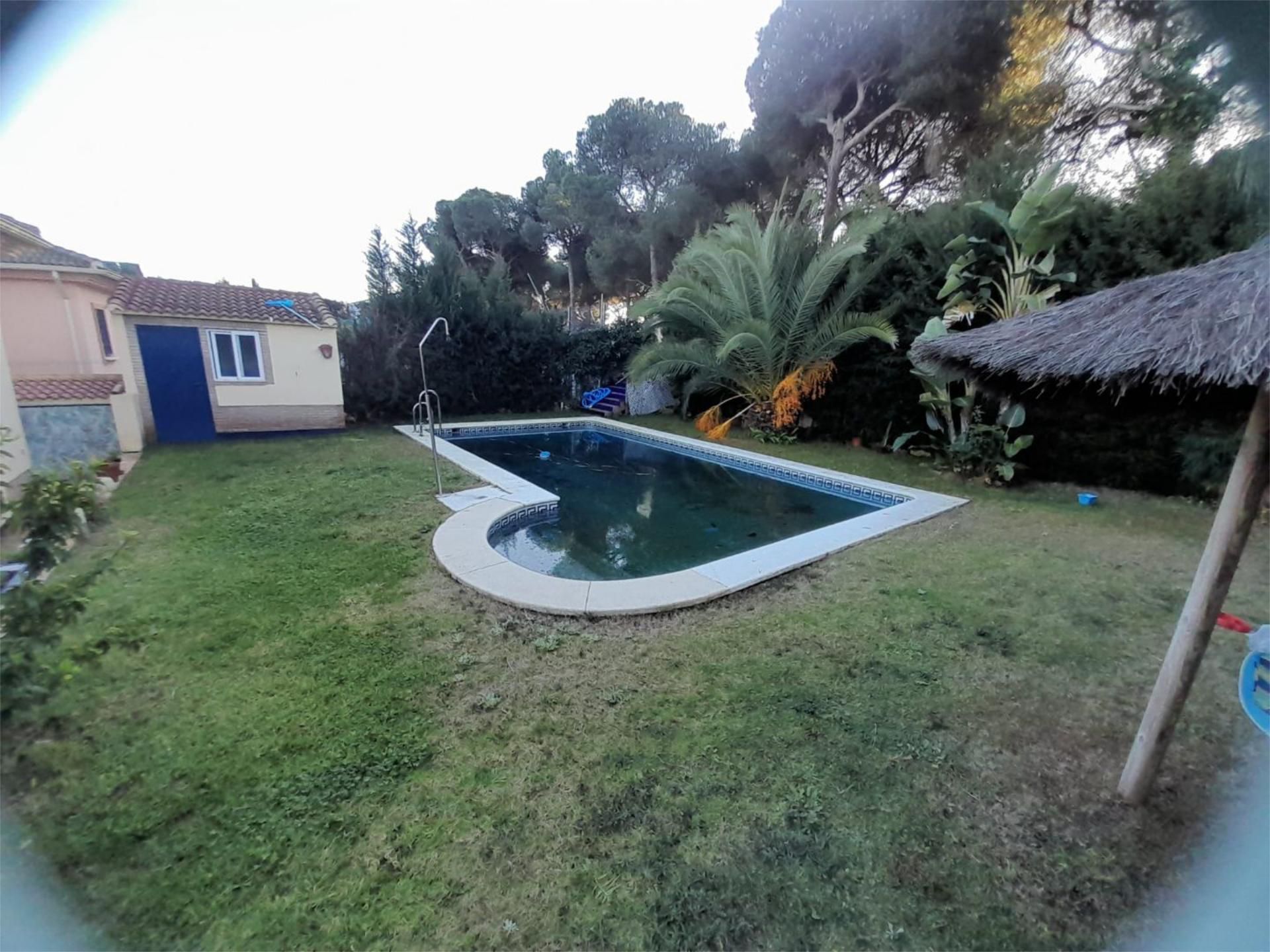 Swimming pool of House or chalet for sale in El Portil  with Air Conditioner, Terrace and Swimming Pool