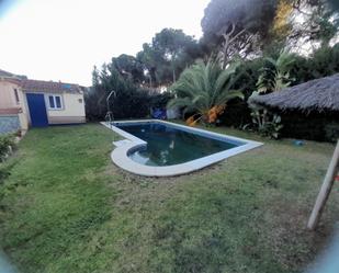 Swimming pool of House or chalet for sale in El Portil  with Air Conditioner, Terrace and Swimming Pool