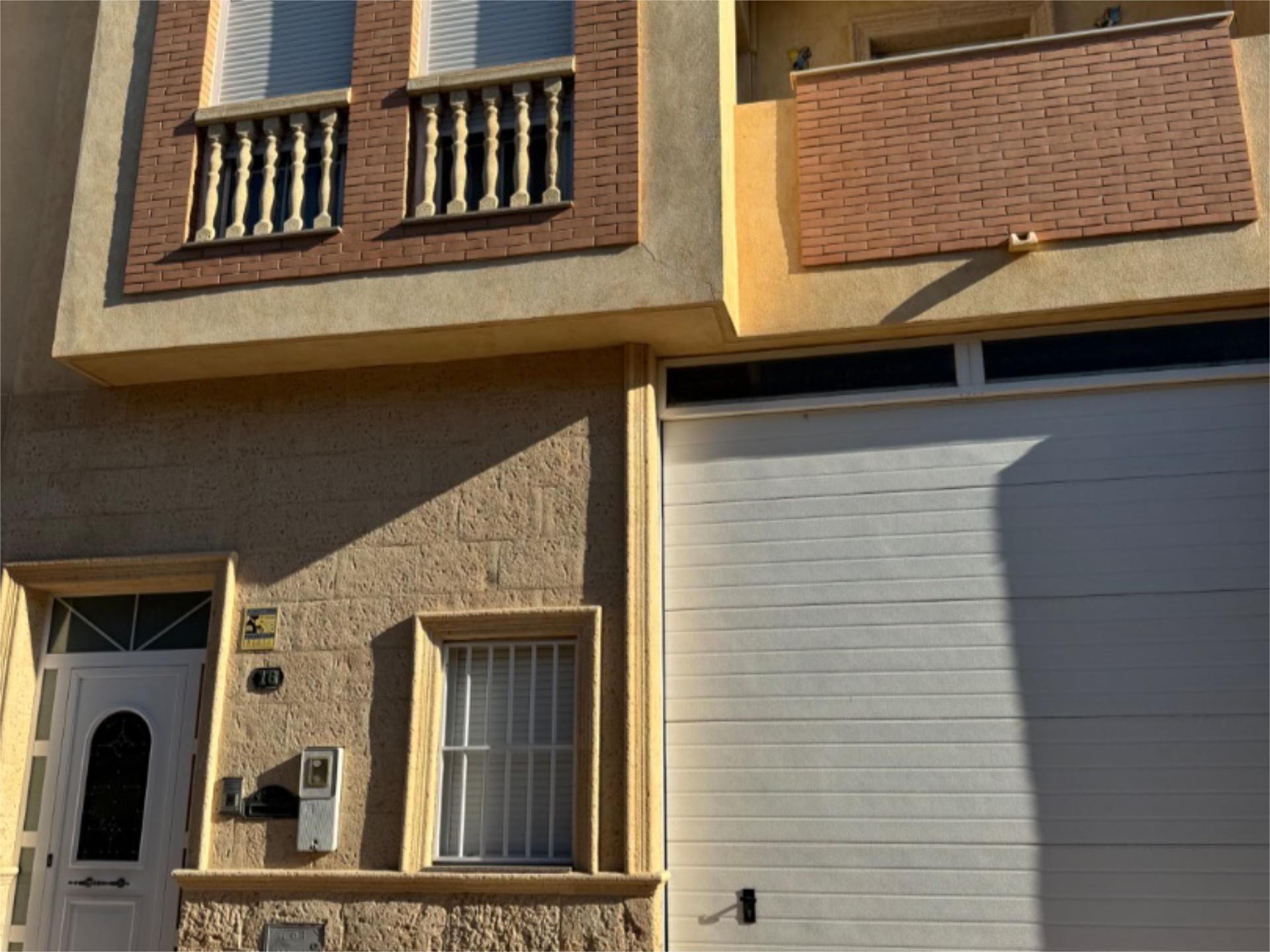 Exterior view of Single-family semi-detached for sale in Roquetas de Mar  with Air Conditioner and Balcony