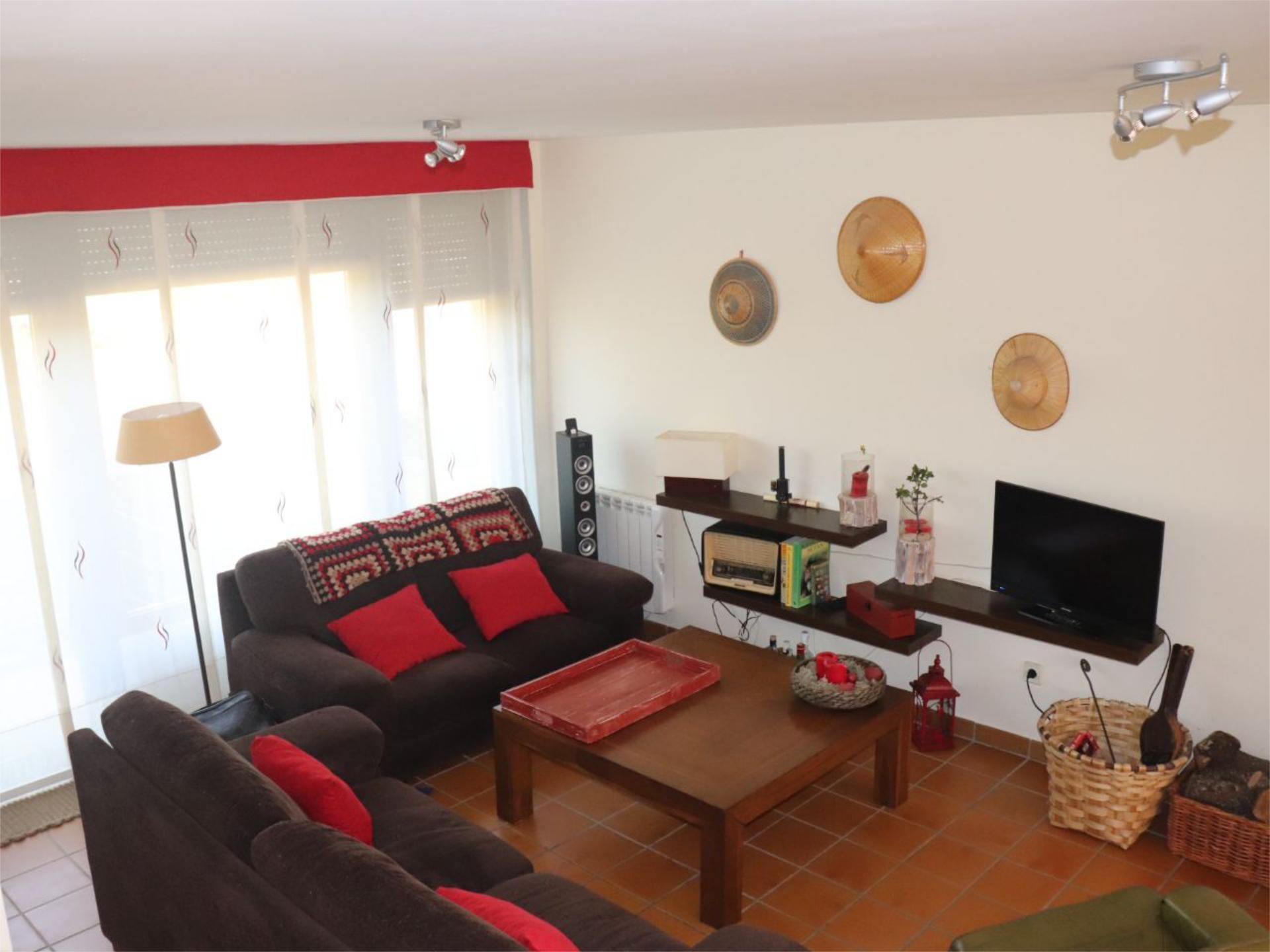 Sala d'estar de Casa adosada en venda en Arcones amb Terrassa