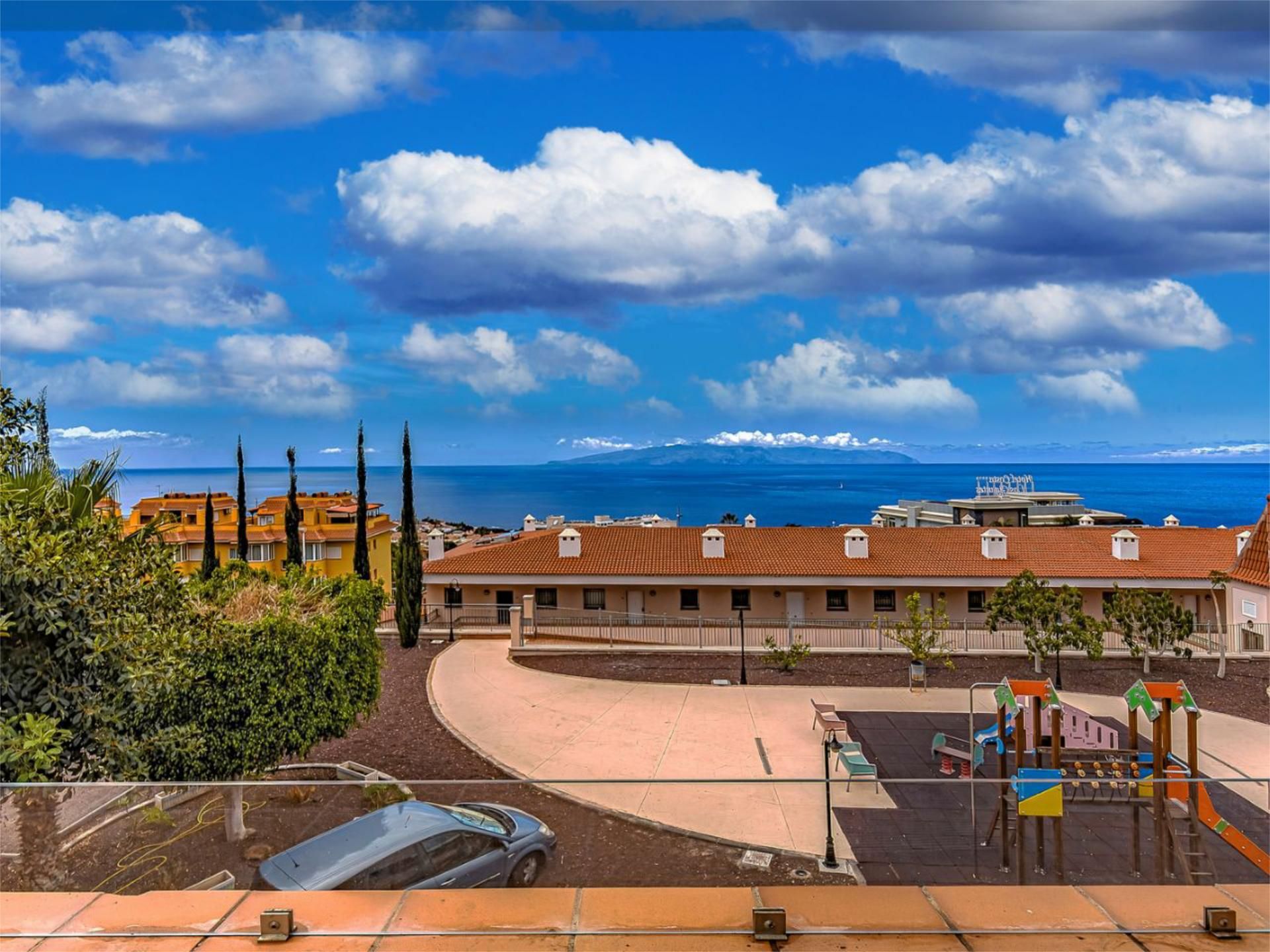 Exterior view of Single-family semi-detached for sale in Santiago del Teide  with Air Conditioner, Private garden and Terrace