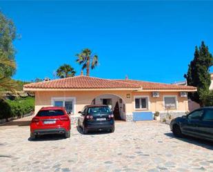Exterior view of Single-family semi-detached for sale in Mutxamel  with Terrace and Swimming Pool
