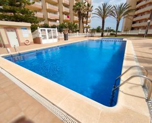 Piscina de Pis de lloguer en Guardamar del Segura amb Jardí privat, Terrassa i Piscina