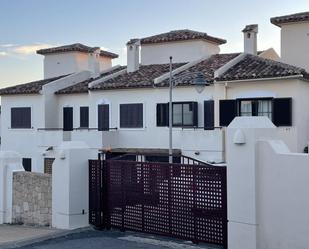 Vista exterior de Casa adosada en venda en Finestrat amb Aire condicionat, Calefacció i Jardí privat