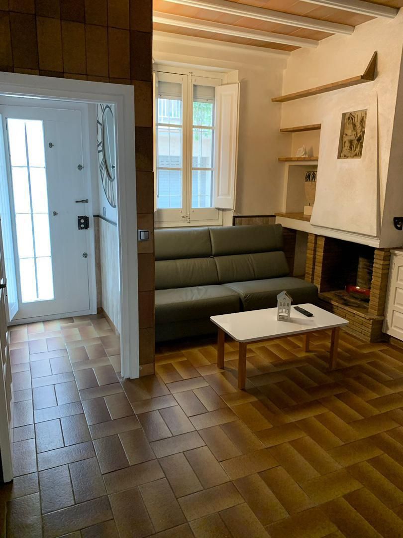 Sala d'estar de Casa adosada en venda en Calonge i Sant Antoni amb Aire condicionat i Terrassa