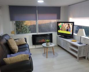 Sala d'estar de Apartament de lloguer en Santa Coloma de Farners amb Aire condicionat, Calefacció i Jardí privat