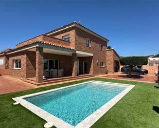 Swimming pool of House or chalet for sale in Cubelles  with Air Conditioner, Terrace and Swimming Pool