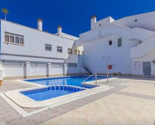 Swimming pool of Planta baja for sale in San Pedro del Pinatar  with Air Conditioner, Terrace and Storage room